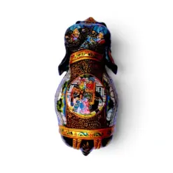 Hand painted wooden elephant figurines with colorful Persian miniature artwork.