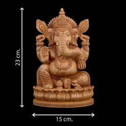 Wooden Ganesha Statue with ornate carvings, 23 cm tall and 15 cm wide.