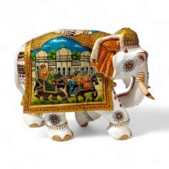 Colorful Indian ceramic elephant sculpture with traditional motifs and royal procession scene.