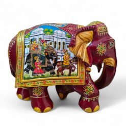 Colorful Indian decorative elephant sculpture with intricate mural.