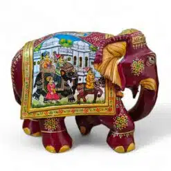Colorful Indian decorative elephant sculpture with intricate mural.
