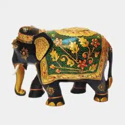 Colorful Indian-style ornamented elephant figurine with gold accents and intricate floral designs.