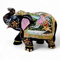 Decorative hand-painted elephant figurine with floral designs.