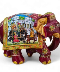Colorful Indian decorative elephant sculpture with intricate mural.
