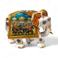 Colorful Indian ceramic elephant sculpture with traditional motifs and royal procession scene.