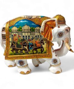 Colorful Indian ceramic elephant sculpture with traditional motifs and royal procession scene.