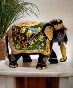 Colorful handcrafted elephant figurine with gold accents, floral patterns, and intricate detailing.