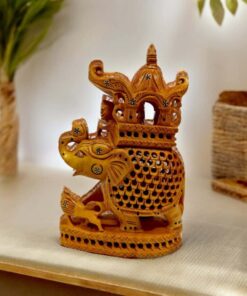 Decorative wooden elephant sculpture with Howdha and cultural craftsmanship.