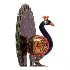 Wooden hand painted peacock statue close up painting work