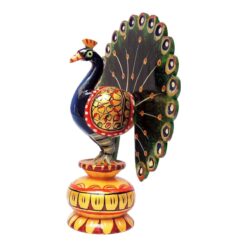 Wooden peacock figurines hand painted on sitting on stand