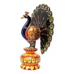Wooden peacock figurines hand painted on sitting on stand