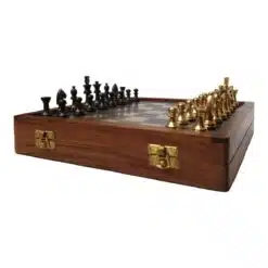 brass chess pieces on a wood board