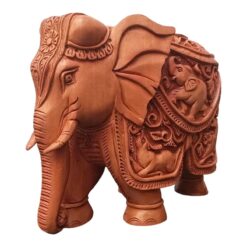 Carved elephant sculpture with animals carving like deer elephant and lion on elephant it.
