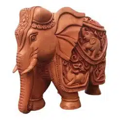 Carved elephant sculpture with animals carving like deer elephant and lion on elephant it.