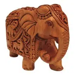 handmade wood carving elephant a ball in elephant trunk.