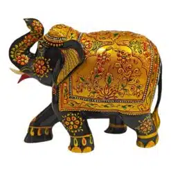 Wood painted elephant statue black and gold color painted with flower design work on it.
