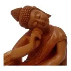 wooden Buddha bust close up view of Buddha statue