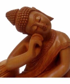 wooden Buddha bust close up view of Buddha statue