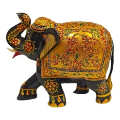 Wood painted elephant statue black and gold color painted with flower design work on it.
