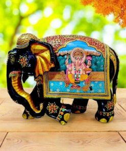 Wooden elephant statue with lord Ganesha figurines painted on elephant