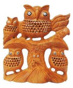 Wooden owl sculpture with three baby owl siting on wood tree jail and inlay work on it.