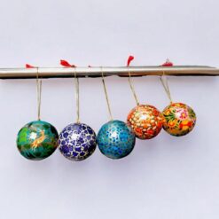 paper mache baubles hanging on tree