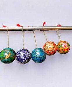 paper mache baubles hanging on tree