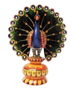 wooden peacock hand painted with water color sitting on painted wood stand