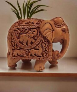 handmade kadam wood carving elephant statue with deep carving on it