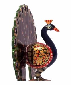 Wooden hand painted peacock statue close up painting work