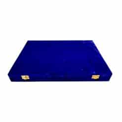 Luxury blue velvet jewelry box with brass clasps and elegant craftsmanship.