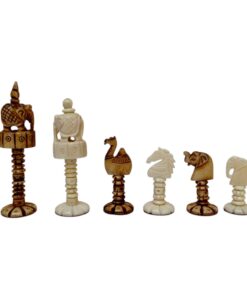 Artistic handcrafted chess pieces featuring cultural motifs and intricate animal and figure designs.