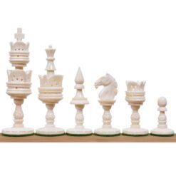Elegant ivory chess pieces set with intricate designs, including king, queen, knight, bishop, rook, and pawns.