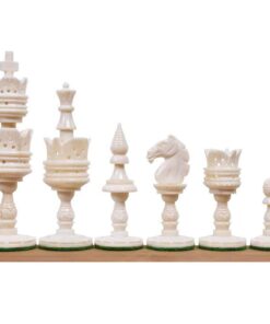 Elegant ivory chess pieces set with intricate designs, including king, queen, knight, bishop, rook, and pawns.