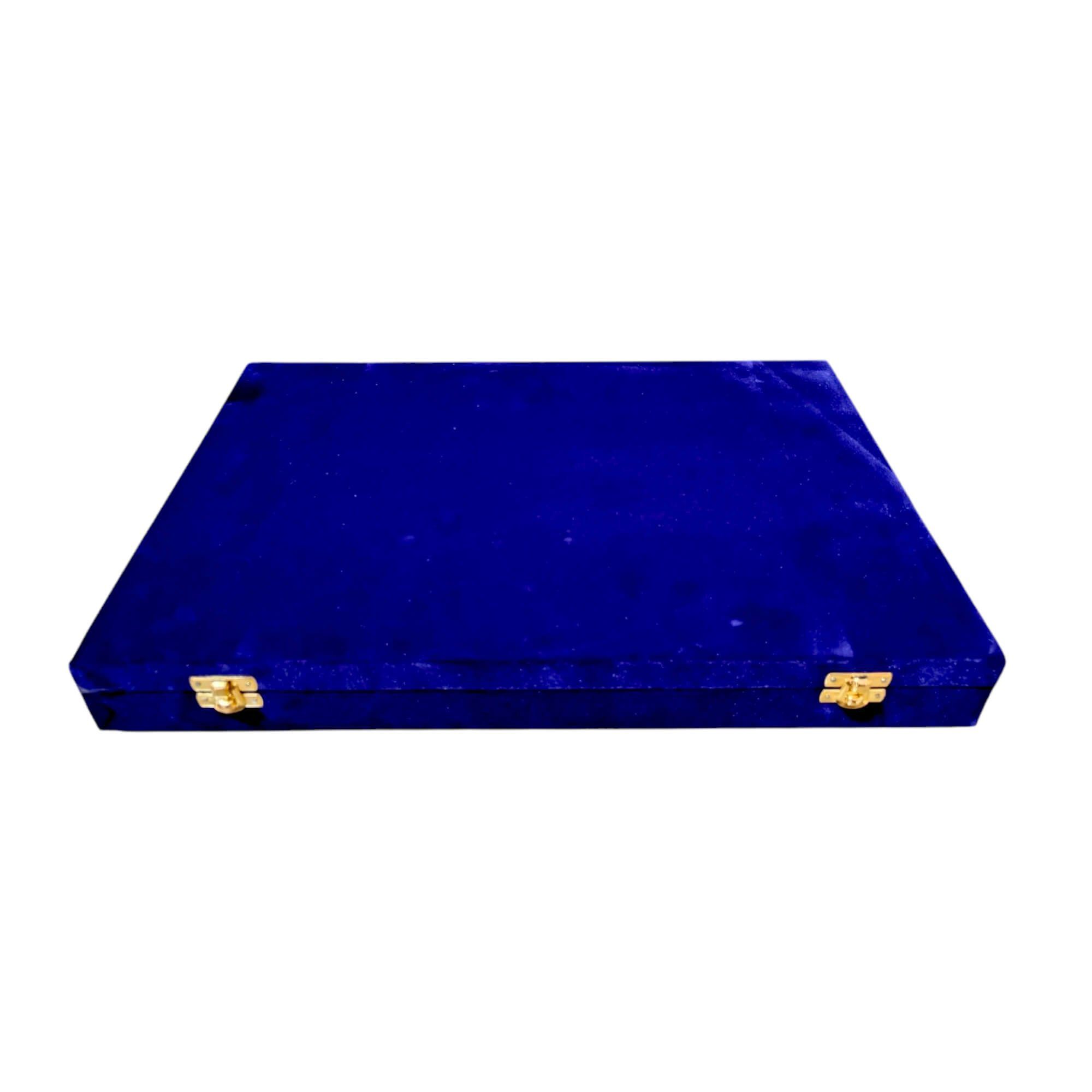 Elegant blue velvet gift box with gold clasps and luxurious craftsmanship.