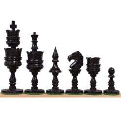 Elegant black wooden chess pieces set with glossy finish and green felt bases.