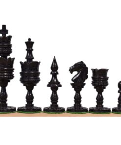 Elegant black wooden chess pieces set with glossy finish and green felt bases.