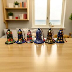 Colorful Decorative Bells Wooden Table