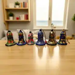 Colorful Decorative Bells Wooden Table