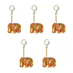 Colorful elephant keychains with intricate patterns and gold accents for cultural and decorative use.
