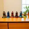 Colorful Metal Bells Wooden Table