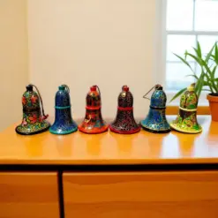 Colorful Metal Bells Wooden Table