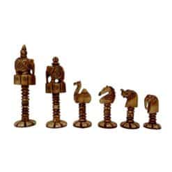 Intricately carved cultural-themed bone chess pieces on spiral bases, featuring elephants, swans, and regal designs.