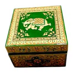 Hand-painted wooden box with an elephant, floral motifs, gold accents, and vibrant green background.