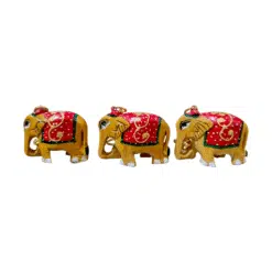 Handcrafted mini golden elephants with red and green accents, perfect for decorative or collectible purposes.
