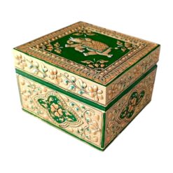 Decorative green jewelry box with gold accents, floral patterns, and ornate elephant top design.