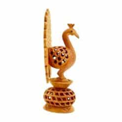 wood handmade peacock on base
