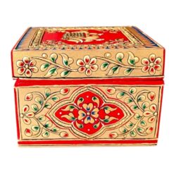 Wooden hand painted jewellery box with red floral folk art design.