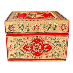 Wooden hand painted jewellery box with red floral folk art design.