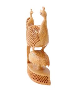 Handcrafted wooden peacock sculpture with intricate feather lattice and elegant organic design.